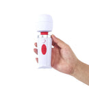 Adam & Eve Mini Magic Massager White held in hand, showcasing its compact design and easy-to-use controls.