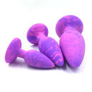 Adam & Eve Groovy Booty Silicone Anal Trainer Set featuring three colored silicone plugs in varying sizes.