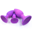 Adam & Eve Groovy Booty Silicone Anal Trainer Set in purple, featuring three graduated plugs for anal training.