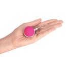 Intimina LASELLE Large 48 g Weighted Kegel Exerciser in a hand, designed for advanced pelvic floor training.