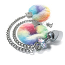 NIXIE Metal Butt Plug & Furry Handcuff Set Unicorn featuring colorful faux fur cuffs and shiny metal plug.