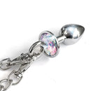 NIXIE Metal Butt Plug & Furry Handcuff Set Unicorn with sparkling jewel detail and detachable chain.