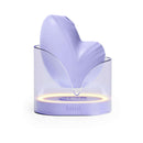 Biird Namii Clitoral Stimulator Lilac displayed in a clear stand, showcasing its elegant design and soft silicone.