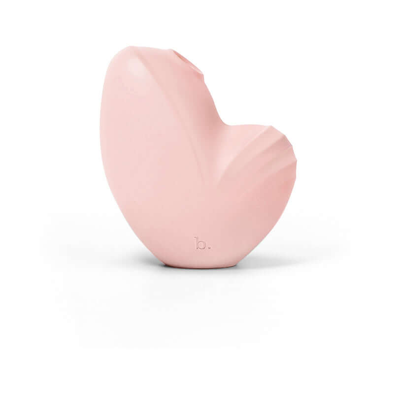 Biird Namii Clitoral Stimulator Peach, a soft silicone 2-in-1 suction and vibration toy for hands-free pleasure.