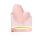 Biird Namii Clitoral Stimulator Peach in elegant display case with soft pink silicone design.