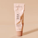 Sex Au Naturel Vulva Balm Soothing Moisturizer tube by Bijoux Indiscrets on a minimalist background.