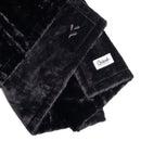 Splash Blanket Furlush Medium Black close-up showing plush velvet texture and logo.