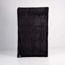 Splash Blanket Furlush Medium Black, a luxurious waterproof and stain-proof blanket with plush velvet and faux rabbit fur.