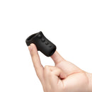 b-Vibe Flex Ring Shaft Silicone Cock Ring Ball Stretcher held in hand to showcase its design and texture.