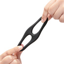 b-Vibe Flex Ring 8 Silicone Cock and Ball Ring Black being held, showcasing its dual-loop design for enhanced sensation.
