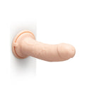 Together Toy 8.5 Inch Realistic Dildo Suction Cup mounted on a wall, featuring a lifelike design and smooth texture.