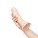 Together Toy 8.5 Inch Realistic Dildo Suction Cup held in hand, showcasing its lifelike design and suction base.