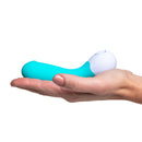 Ohmibod Lovelife Cuddle Mini G-Spot Vibrator Turquoise in a hand, showcasing its compact design and vibrant color.
