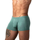 Male Power Eco Cozy Pouch Short Green M displayed on a model, showcasing its comfortable fit and supportive design.