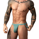 Male Power Eco Cozy Jock Green L/XL showcased on a muscular model with tattoos, emphasizing comfort and style.