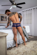 Model wearing Male Power Sassy Lace Mini Short Sheer Pouch Navy M, showcasing comfort and style in intimate settings.