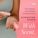 Sweetums Sweet Spot Flavored Fragrance Golden Vanilla solid perfume stick held by a woman.