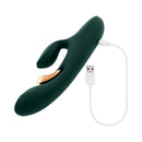 Evolved Golden Goddess G-spot Flicker Vibrator Green charging with USB cable and rose gold accents.