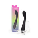 Spectrum Essentials Silicone G-spot Vibrator Black in packaging on display, highlighting its curved design and texture.