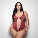 Fantasy Lingerie Elusive Anya Teddy Underwire Cups XL/2XL in burgundy lace and sheer mesh on a model.