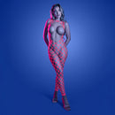 Model wearing Fantasy Lingerie Glow Want It All Reversible Bodystocking OS in rhinestone net under blue lighting.