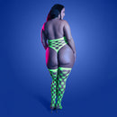 Fantasy Lingerie Glow Adrenaline Teddy & Stockings Set showcasing a model in geometric diamond fishnet lingerie and stockings.