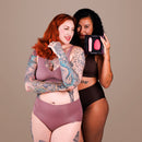 Je Joue Double Trouble Rechargeable Vibrator Set displayed by two models in stylish lingerie.