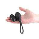 NS Novelties Love Notes Smooth Vibrating Plug Black held in a hand for scale, showcasing sleek design and features.