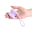 Image of NS Novelties Love Notes Smooth Vibrating Plug Lilac held in a hand, showcasing its sleek design and soft silicone material.