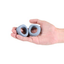 Renegade Alpha Silicone Cock Ring Set Gray held in hand, showcasing two sizes of soft silicone rings.