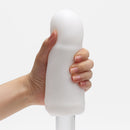 Tenga 3dx Zen Male Masturbator Sleeve being held, showcasing its sleek design and refined features.