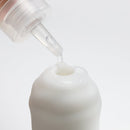Tenga 3DX Flow Male Masturbator with lubricant being applied, showing detailed design and functionality.
