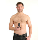 Prowler RED Bubble Rechargeable Butt Plug With Remote held by a shirtless man, showcasing its sleek design.