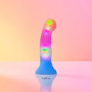 Love To Love Candy Loop LED Silicone Dildo with vibrant LED lights on a pastel background.