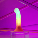 Love To Love Sugar Bomb LED Silicone Dildo with 39 LED gradient modes in vibrant colors.