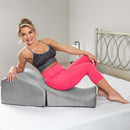 Liberator Flip Ramp Sex Positioning Pillow Lush Grey used as a stylish ottoman alternative for intimacy.