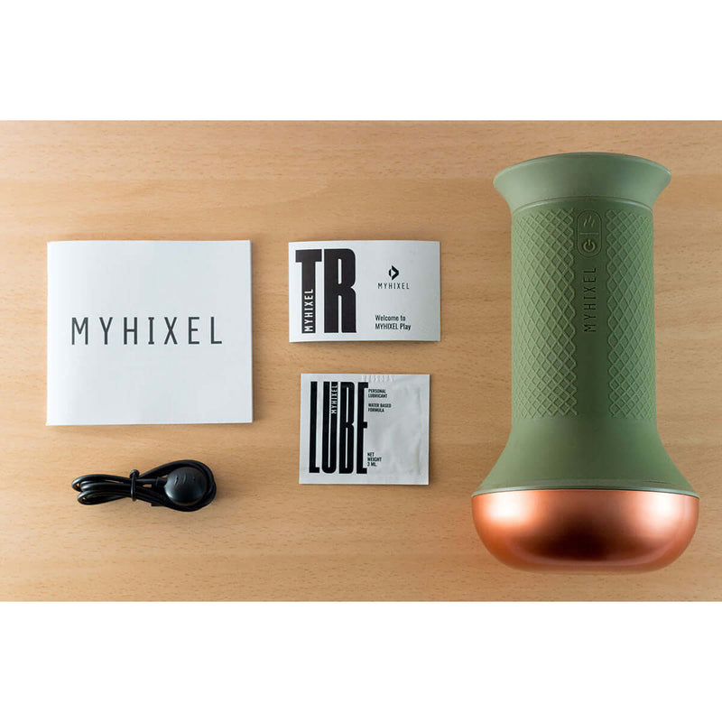 MYHIXEL TR Training Masturbator with accessories including manual, lube, and charging cable on a wooden surface.