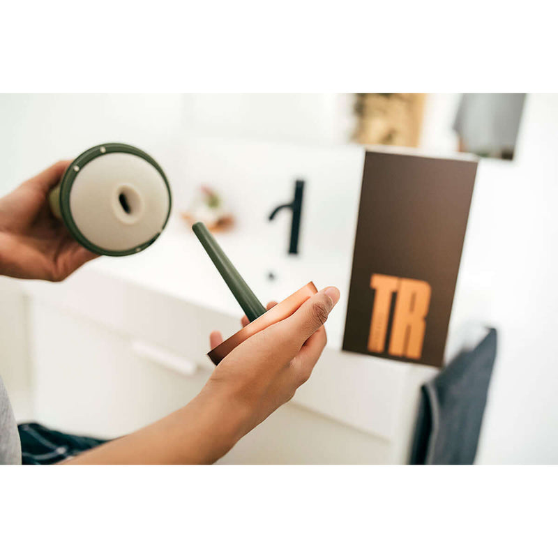 MYHIXEL TR Training Masturbator being held, demonstrating its innovative design and features.