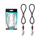 Nipple Halos Bitch Charms Silicone Nipple Jewelry Black in packaging with elegant design and decorative beads.
