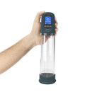 Lux Active Volume LCD Auto Penis Pump Navy held in hand, showcasing its high-tech design and display features.