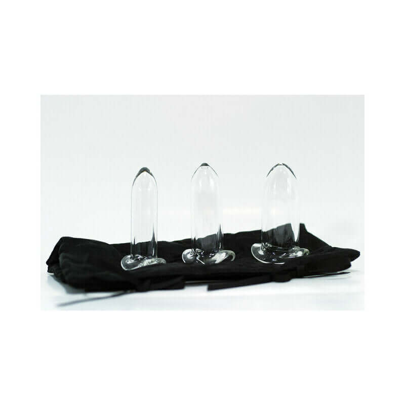 Crystal Delights Pacik Dilator 3 Piece Set displayed on a black cloth for intimate therapy and recovery.