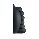 Banana Pants Honeybunch Silicone Grinding Cushion Black viewed from the side, showcasing its contoured design and soft silicone texture.