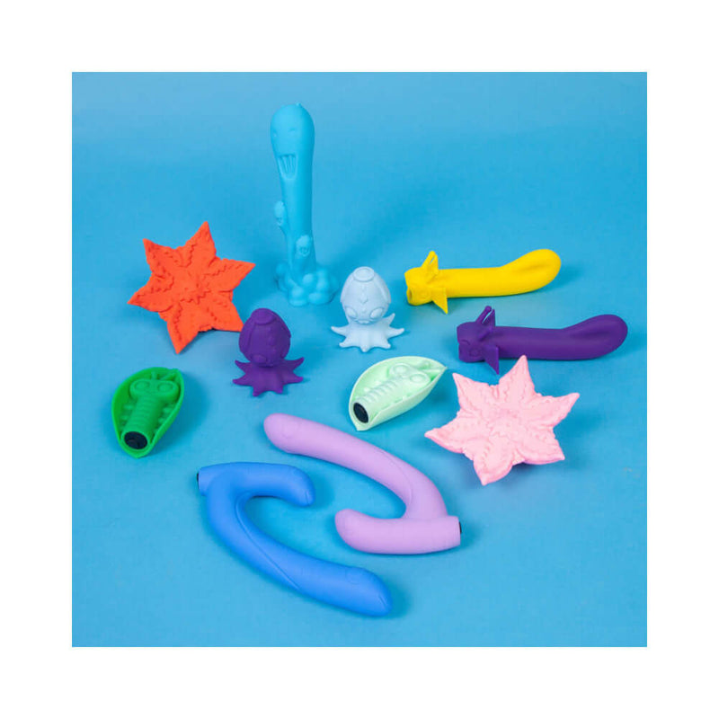 Array of playful and colorful adult toys including the Cute Little Fuckers Jix Vibrator Lavender.