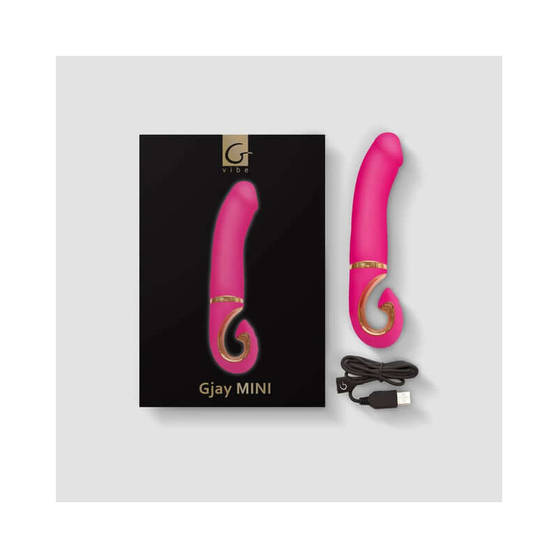 Gvibe Gjay MINI Wildberry compact vaginal vibrator in pink with packaging and charging cable.