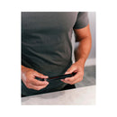 Man holding Eye of Love Matchmaker Black Diamond Attract Him Pheromone 10 ml fragrance in black packaging.