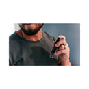 Eye of Love Matchmaker Black Diamond Attract Him Pheromone 10 ml held by a man with a beard wearing a gray t-shirt.