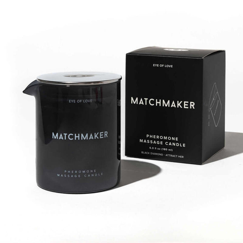 Eye of Love Matchmaker Black Diamond Attract Her Massage Candle in sleek black container and box.