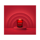 Eye of Love Matchmaker Red Diamond Attract Him Massage Candle displayed in a luxurious red setting.