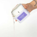 Eye of Love Morning Glow Attract Him Pheromone Massage Candle being poured.