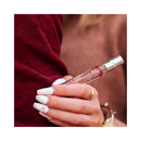 Eye Of Love One Love Attract Him Pheromone Parfum 10 Ml held in hand with white nails and stylish jewelry.